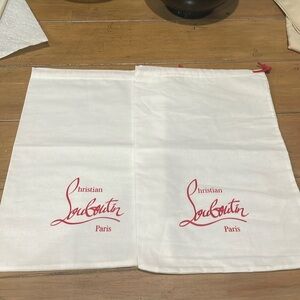 Two Christian Louboutin dust bag